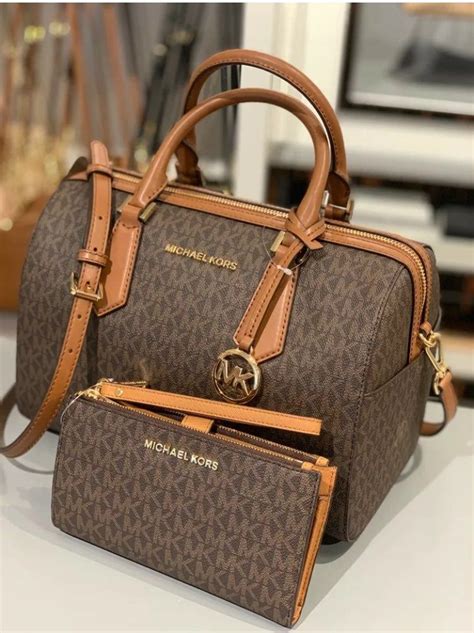 michael kors leather barrel handbags|Michael Kors bag original price.